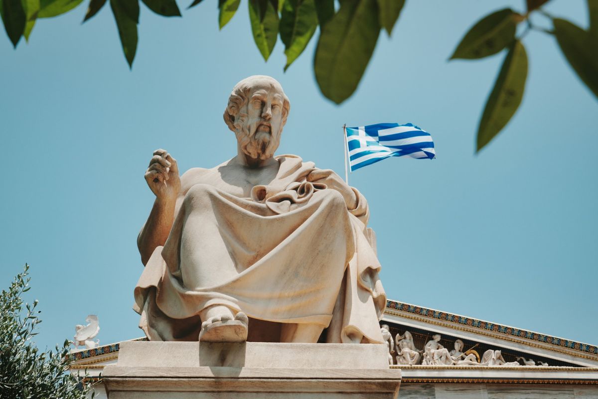 Statue of Plato with the Greek flag, Academy of Athens